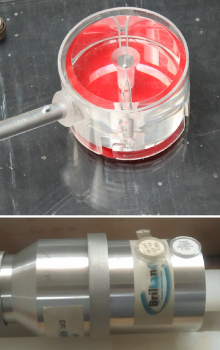 (a) Plug element with inserted neutron source AmBe functioning as very. (b) Tested scintillation detector LaBr3:Ce provided by ESA.